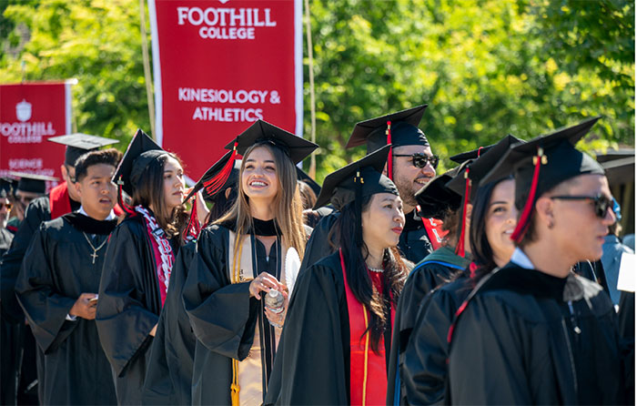 group of student graduates walking