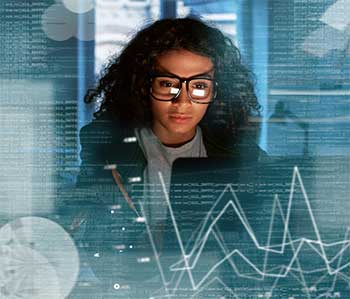 girl with glasses looking at laptop girl with glasses looking at laptop