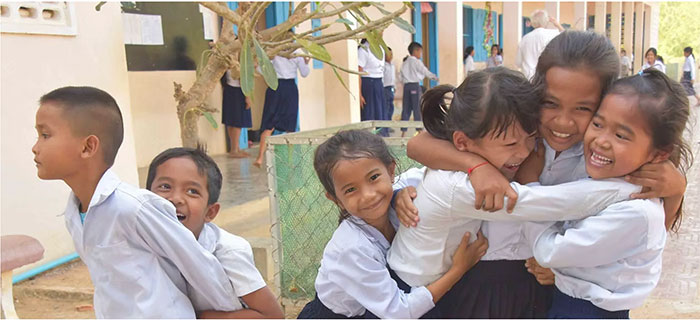 small group of children hugging